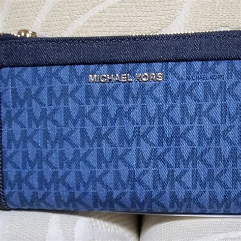 michael kors denim cosmetic bag|Michael Kors denim wallet.